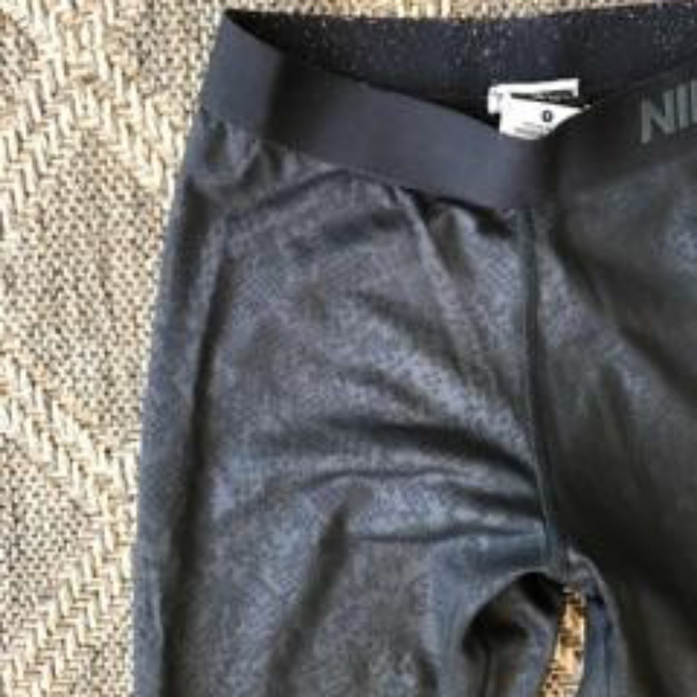 Black shiny snakeskin print leggings